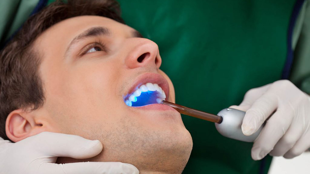 Patient receiving dental treatments